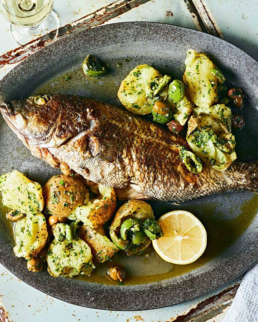 Whole Roasted Black Bass with Potatoes, Green Olives, and Salsa Verde